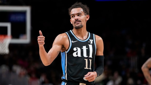 Atlanta Hawks guard Trae Young (11) gestures after being called for a technical foul against the Chicago Bulls during the second half at State Farm Arena.